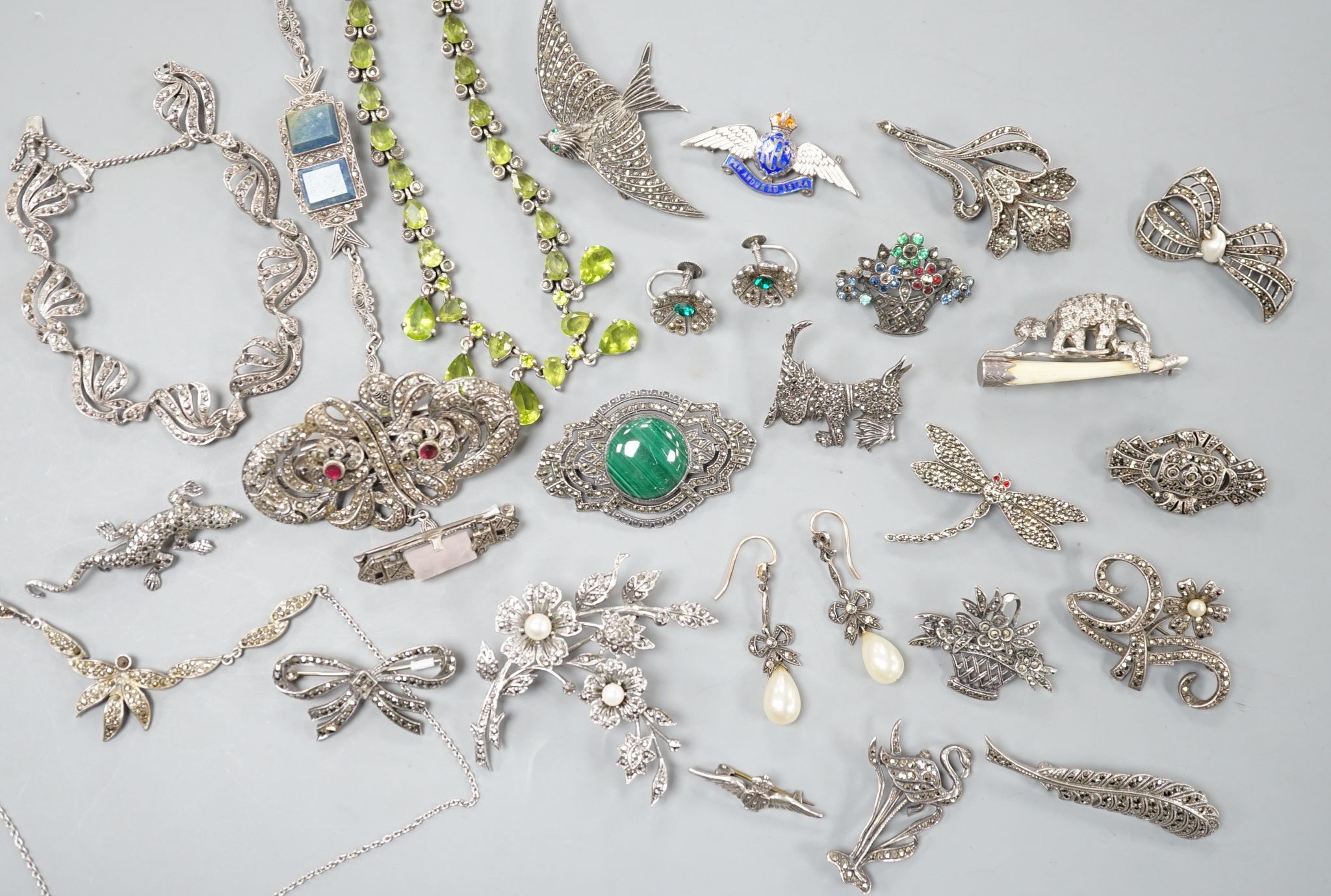 A small collection of assorted mainly white metal and marcasite set jewellery, including brooches, bracelet etc. and an enamelled RAF brooch.